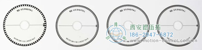 上图显示了四个具有不同行数的光电编码器盘，可以观察到行的密度不同。